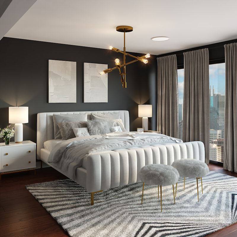 Made bed in a bright bedroom
